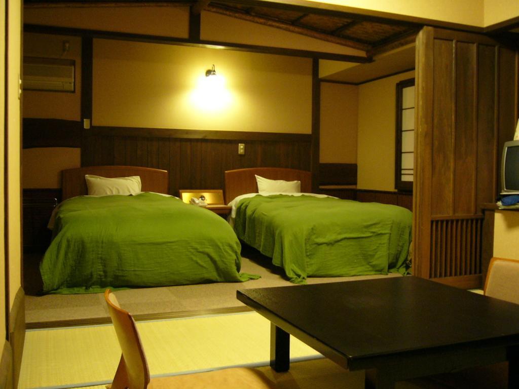 Отель Oyado Kurokawa Асо Экстерьер фото